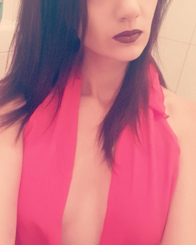 A sexy outfit in red without a bra