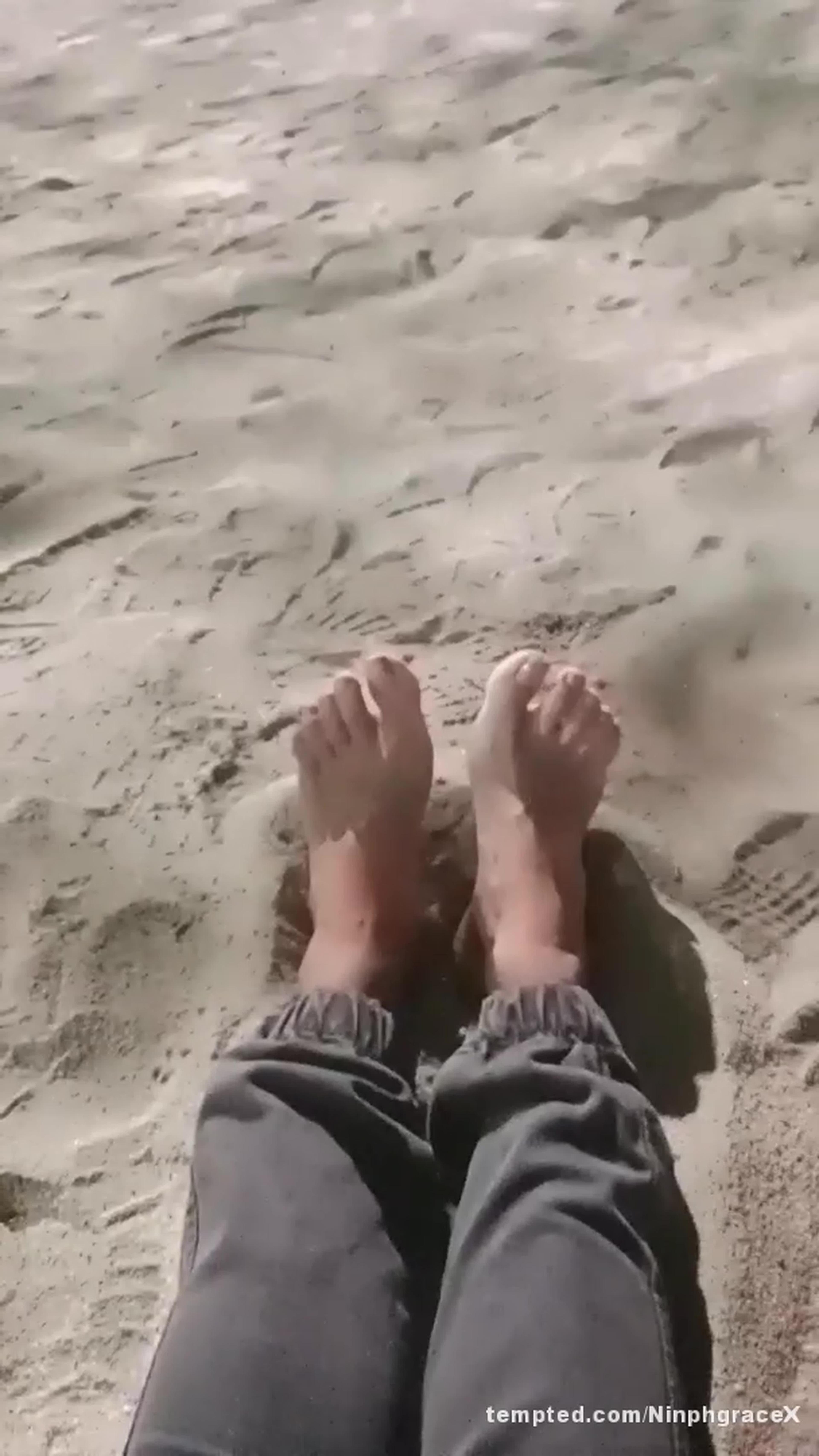 Foot in the sand.